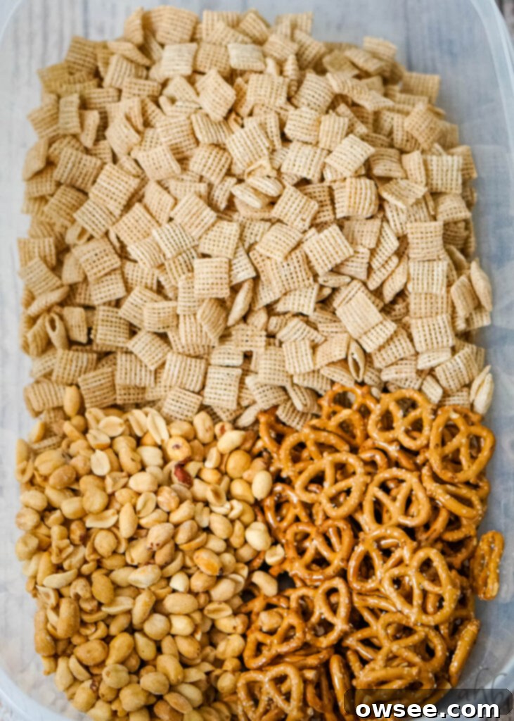 Golden Apple Caramel Crunch 5 Peanuts, pretzels, and Chex cereal in a microwavable bowl.