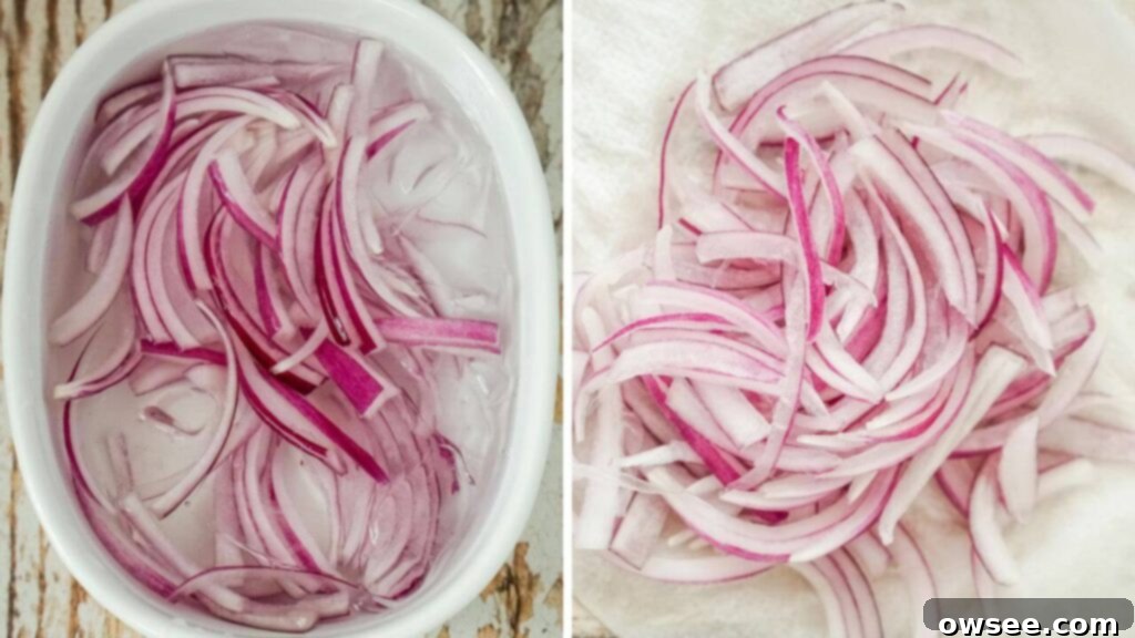 Crisp Apple, Creamy Feta and Spinach Salad 4 Thinly sliced red onions soaking in a bowl of ice water, then dried on paper towels, illustrating a step to mellow their flavor for the salad.