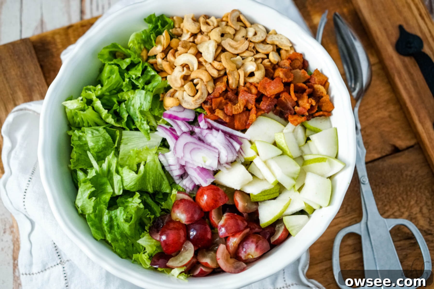Cashew Salad 7 The ingredients are added to the large white bowl.