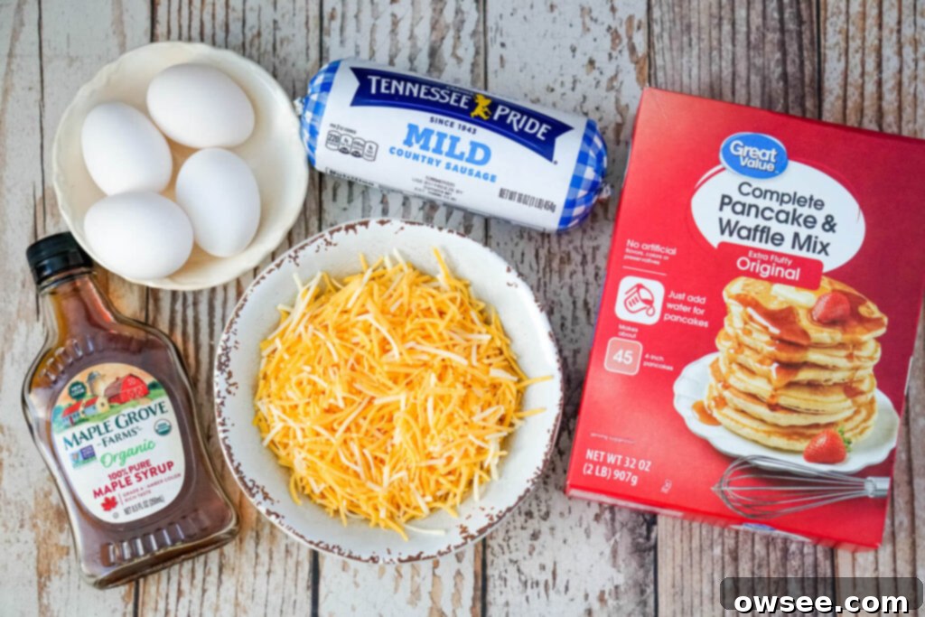 All-in-One Breakfast Muffins 5 The essential ingredients for McGriddle muffins laid out: maple syrup, eggs, cooked sausage crumbles, shredded cheddar cheese, and a box of complete pancake mix.