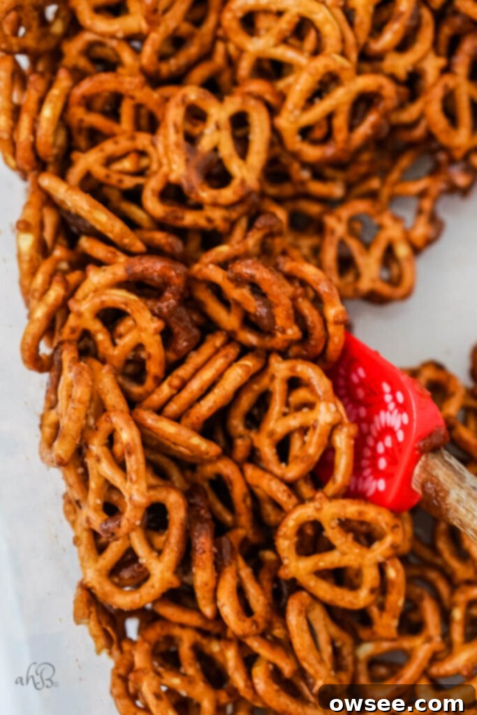 The pretzels are mixed with the butter, sugars, corn syrup and spices 