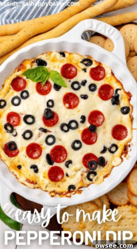 Hot Cheesy Pepperoni Dip 12 A vibrant close-up of a bubbling, hot pepperoni dip, rich with melted cheese, savory pepperoni, and Italian herbs, nestled in a serving dish ready to be enjoyed.