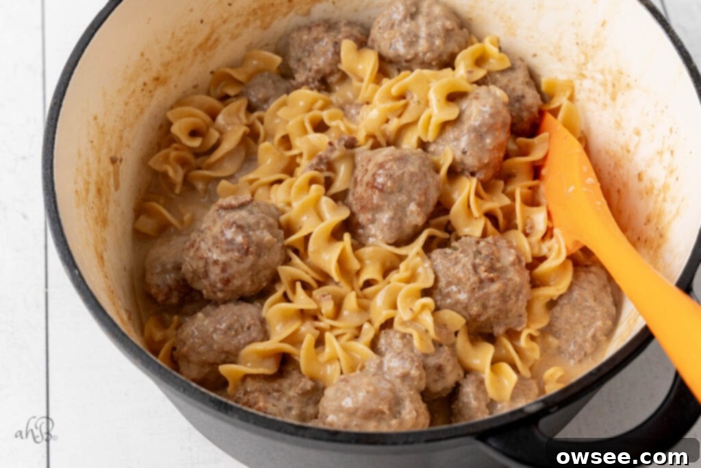 Creamy One Pot Swedish Meatballs and Noodles 9 A finished pot of Swedish Meatballs and noodles, steaming and ready to serve.