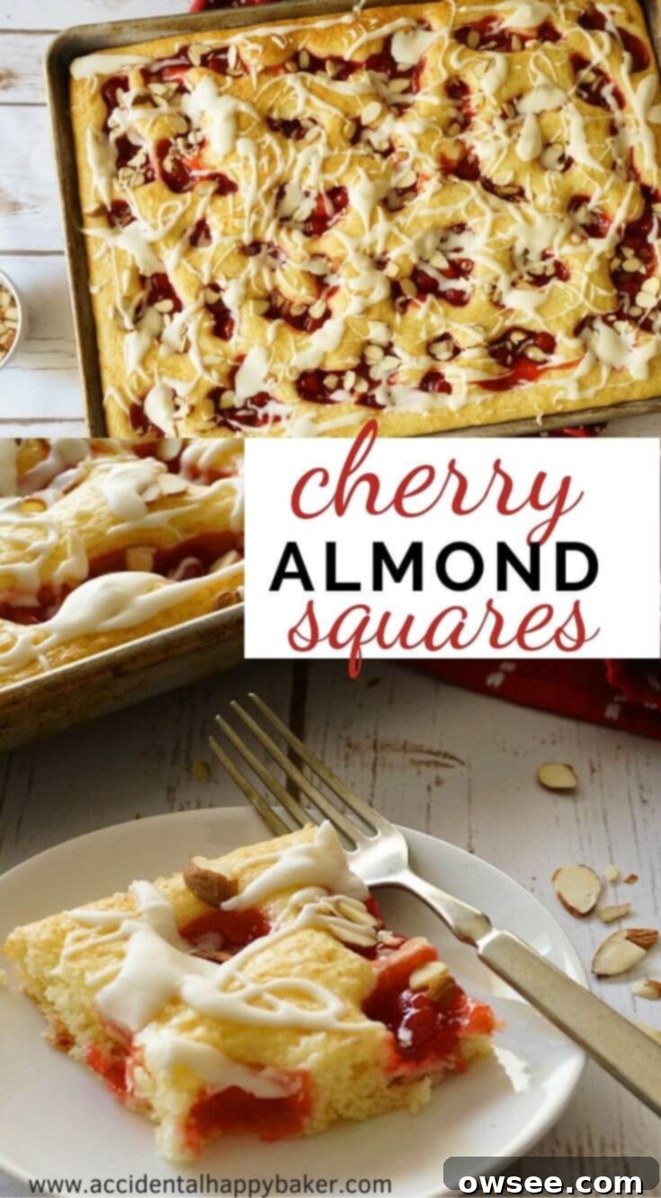 A beautifully arranged large pan of Cherry Almond Squares, glistening with glaze and ready for slicing, emphasizing its suitability for large gatherings.
