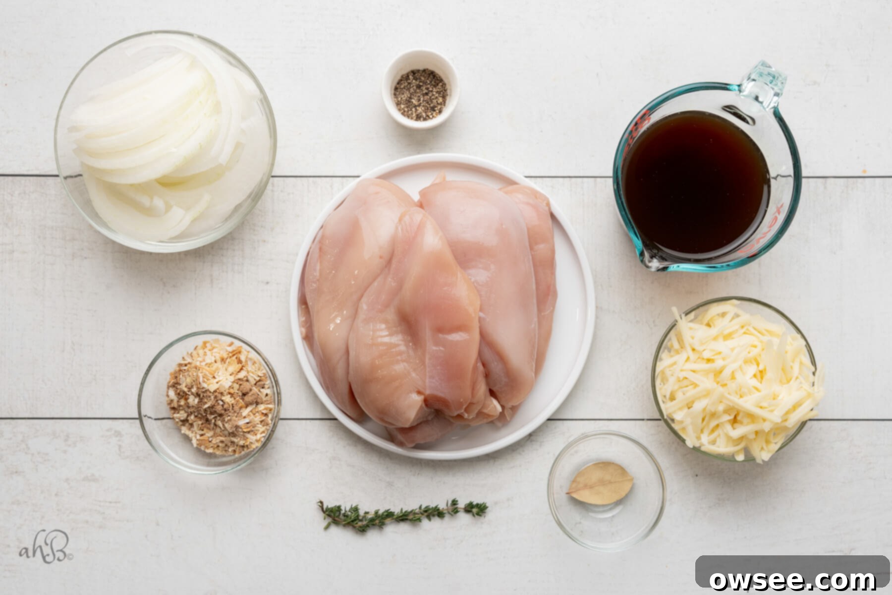 Slow Cooker French Onion Chicken 4 The ingredients for French Onion chicken are separated into different glass bowls.