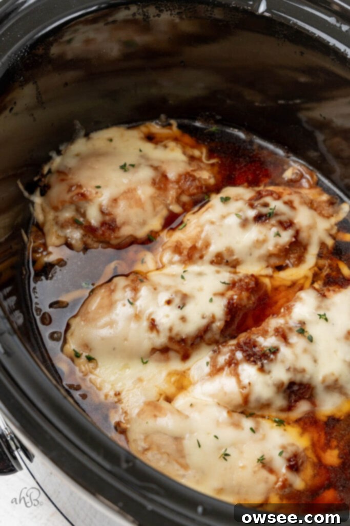 Slow Cooker French Onion Chicken 9 The cheese is melted onto the chicken.
