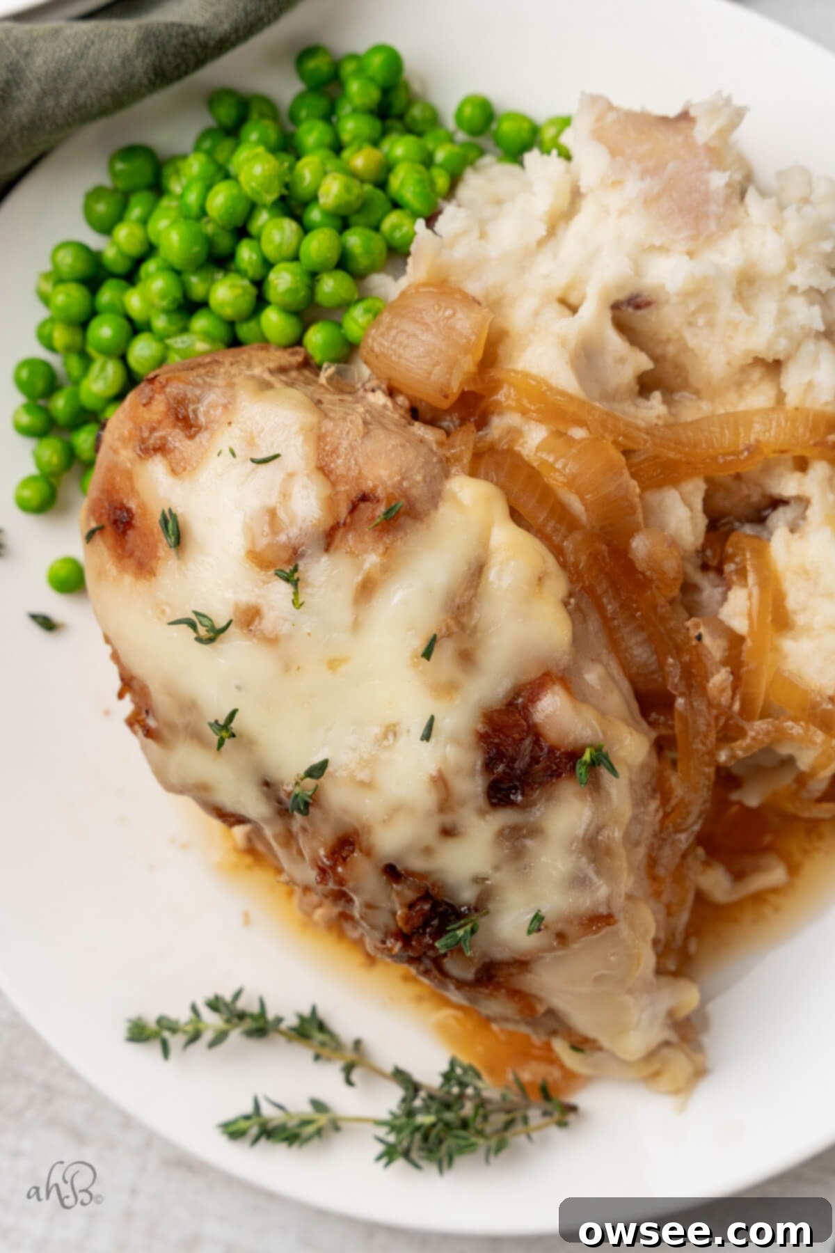 Slow Cooker French Onion Chicken 10 Crockpot French Onion Chicken with melted cheese.