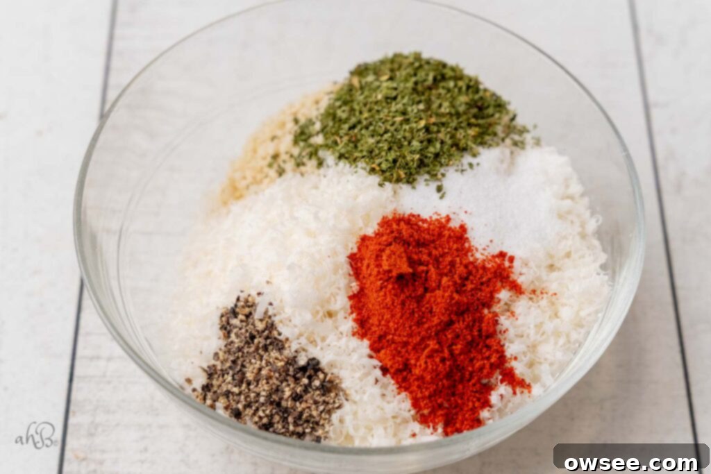 Air Fryer Hot Honey Salmon Bites 6 Panko breadcrumbs, grated parmesan cheese, salt, pepper, paprika, and dried parsley are mixed together in a bowl.