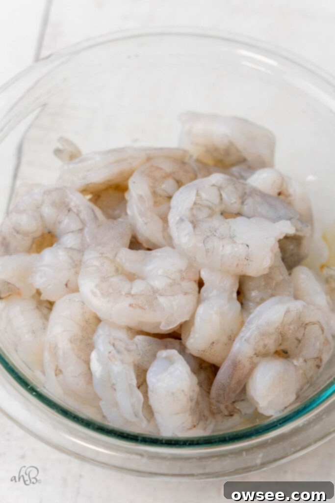 Honey Garlic Glazed Shrimp 6 Step 1: Thaw the shrimp if using frozen and pat dry. Remove tails if desired.