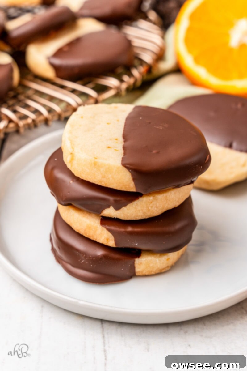 Decadent Orange Chocolate Shortbread 4 A stack of four chocolate Orange Shortbread Cookies.