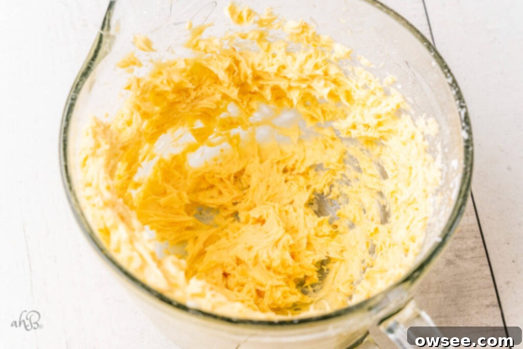 Decadent Orange Chocolate Shortbread 6 The butter and sugar have been blended together in a glass measuring bowl.