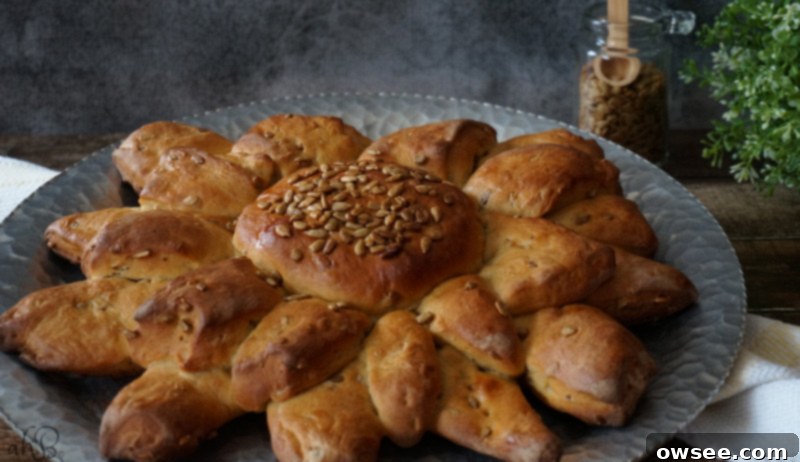 A freshly baked, golden brown loaf of Multigrain Sunflower Bread, ready for slicing.