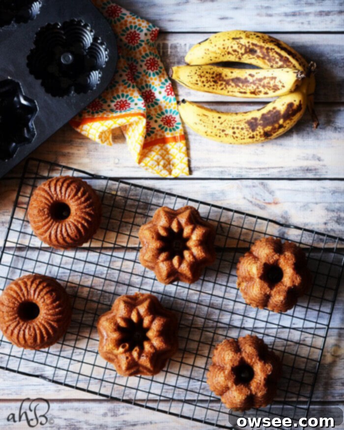 Mini Banana Bundt Delights 3 Collection of Mini Banana Bundt Cakes on a cooling rack