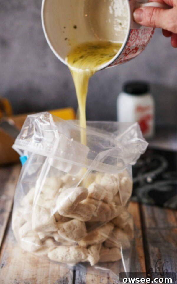 Effortless Garlic Sharing Rolls 3 A bowl of delicious, golden easy pull apart garlic rolls, perfect for serving alongside dinner.