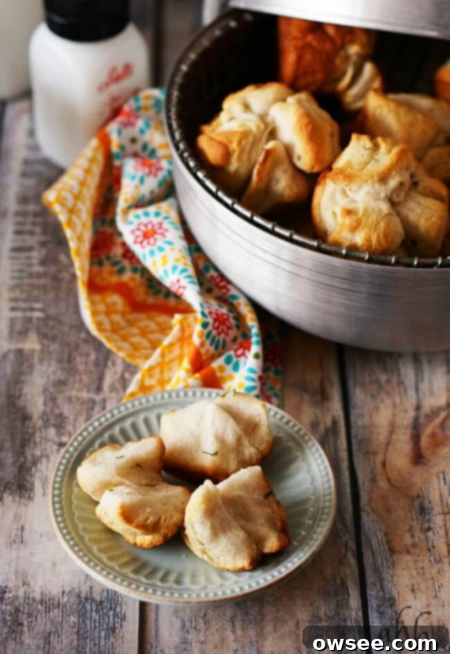 Effortless Garlic Sharing Rolls 5 Easy pull apart garlic rolls, baked to golden perfection in a muffin tin, ready to be served.