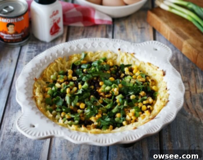 Desert Spice Quiche 5 Spicy and smoky chipotles bring the flavor in this veggie loaded Southwestern Chipotle Quiche. Full of roasted corn, black beans, green onions, cheddar and a hashbrown potato crust. Recipe on www.accidentalhappybaker.com @AHBamy