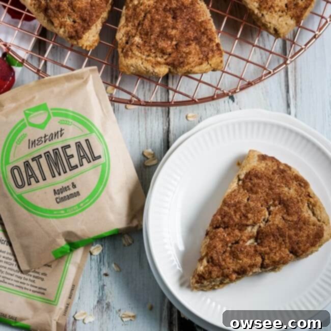 Effortless Oatmeal Scones 10 A square image of a warm, perfectly baked instant oatmeal scone.