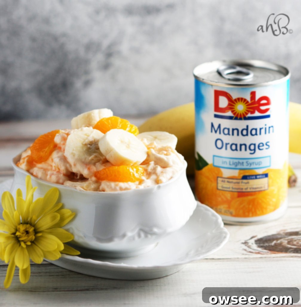 Orange Creamsicle Salad 5 A generous scoop of Orange Dream Salad, highlighting its creamy, vibrant appearance.