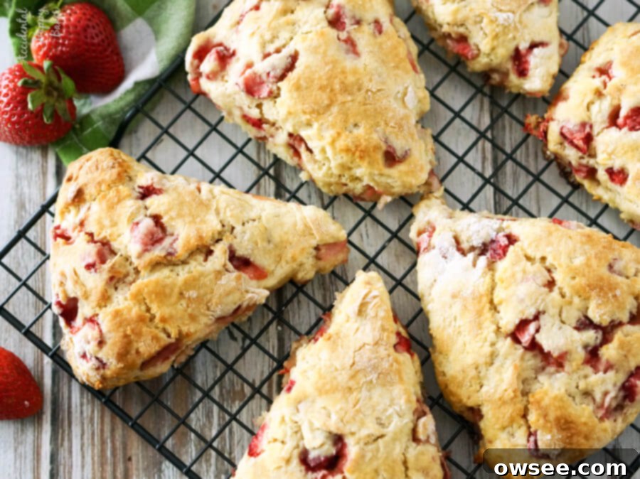 Baked Strawberry Lemon Scones cooling on a wire rack.