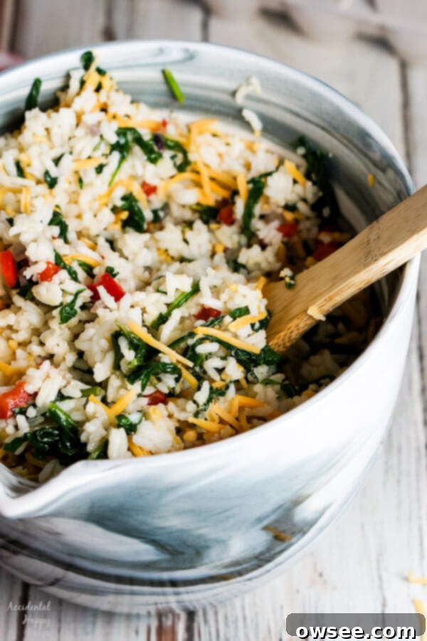 Spinach Rice Casserole, close-up with a fork lifting a serving