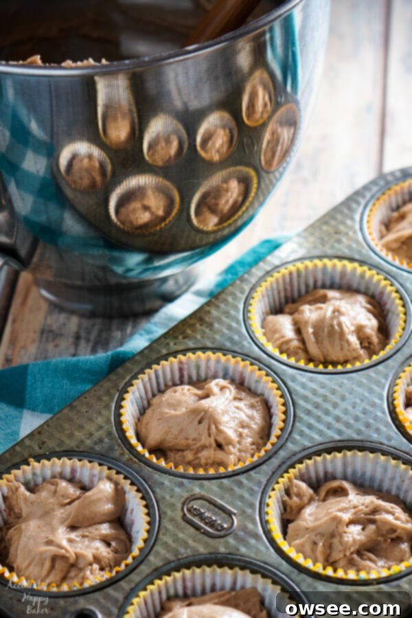 Spiced Nutella Cupcakes baking in the oven, filling the kitchen with an amazing aroma.