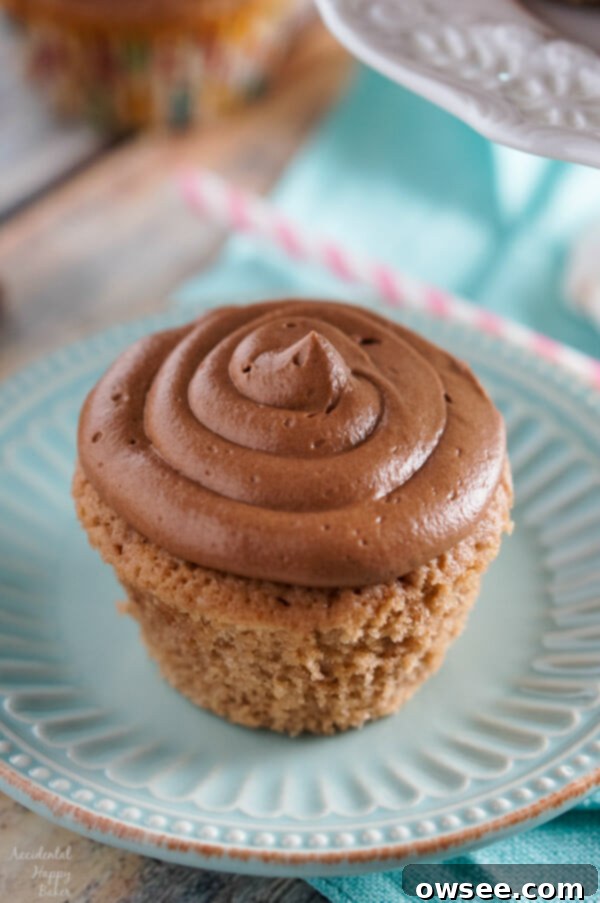 A freshly baked Spiced Nutella Cupcake, perfectly cooled and awaiting its delicious frosting.