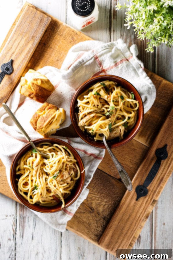 Crockpot Chicken Spaghetti - A creamy, cheesy, and easy slow cooker meal perfect for weeknights.