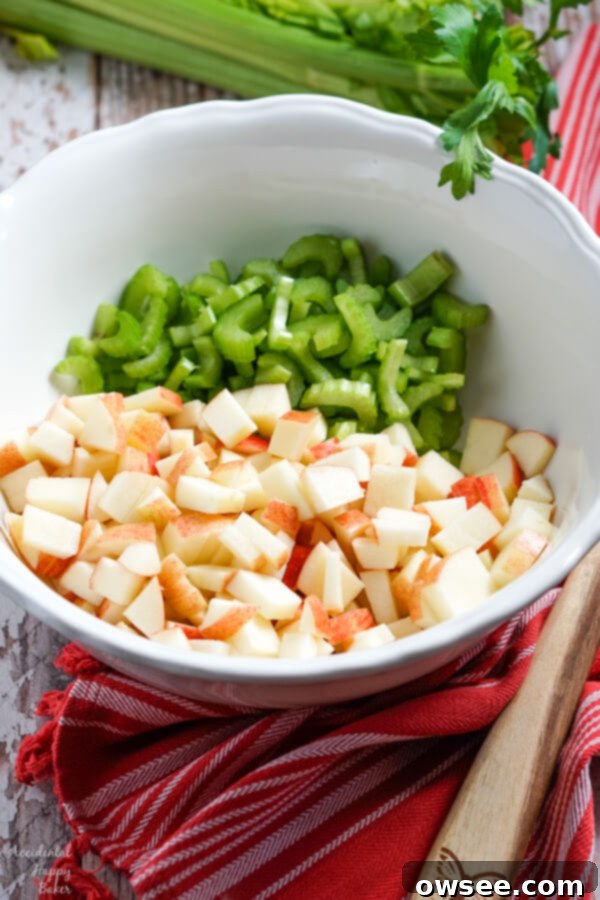 Vibrant Apple Cabbage Slaw with Luscious Poppy Seed Dressing 3 Chopped apples and celery make the base of the apple coleslaw