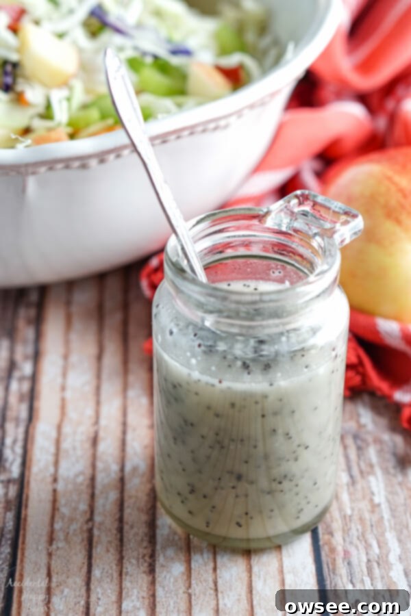 Vibrant Apple Cabbage Slaw with Luscious Poppy Seed Dressing 4 Apple coleslaw is dressed with a homemade poppy seed dressing.
