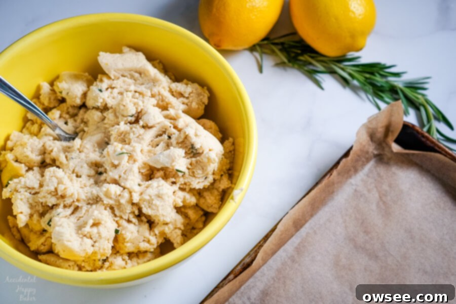 Lemon Rosemary Cookies, simple fresh flavors of lemons and rosemary meld together in these buttery shortbread cookies to make an unassuming cookie with a dynamic flavor combination. #lemon #rosemary #cookies #shortbread #accidentalhappybaker