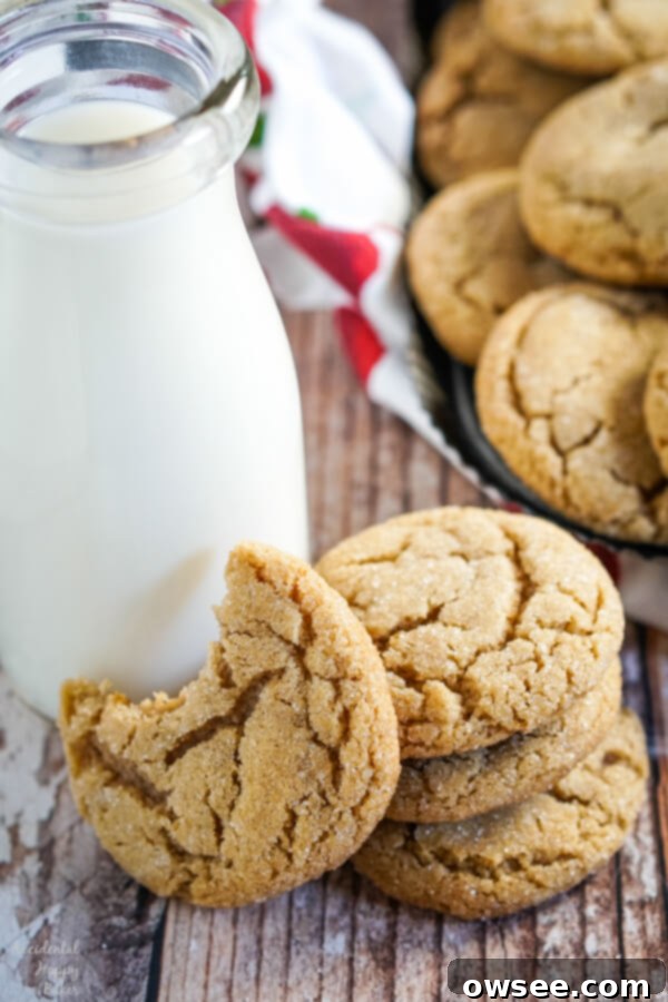 Close-up of a stack of French toast cookies, showing their crinkled tops and soft texture.