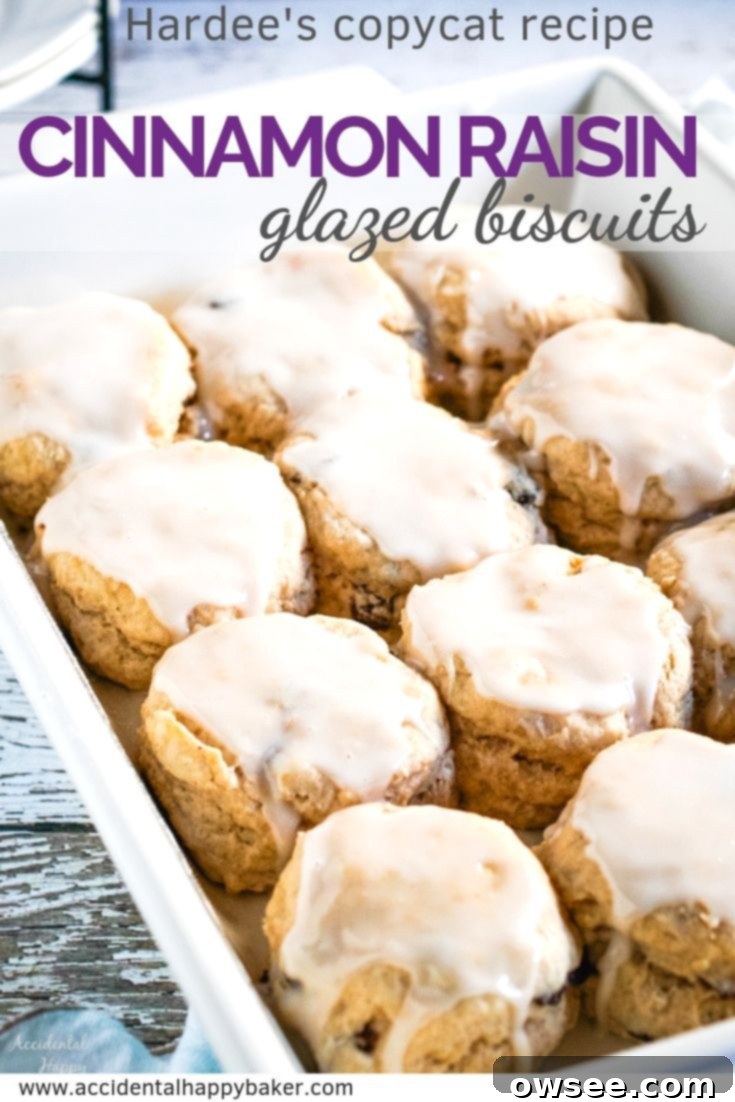 Cinnamon raisin biscuits full of plump raisins and topped with a creamy vanilla glaze taste just like those famous fast food biscuits you remember. #cinnamonraisin #cinnamonraisinbiscuits #glazedbiscuits #Hardeescopycat
