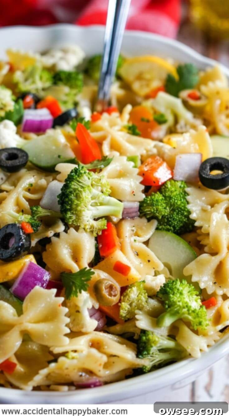 Bright Summer Pasta Delight 8 Summer Vegetable Pasta Salad makes it hard to resist delicious fresh veggies! Colorful fresh vegetables are tossed with pasta and the easiest Italian dressing for a fresh side dish that's perfect for gatherings. #summerpastasalad #summerveggie #veggiepastasalad #accidentalhappybaker