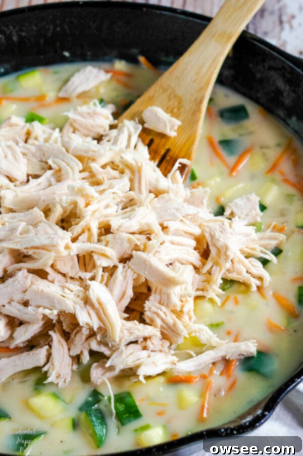 Hearty Chicken Zucchini Delight 5 Shredded chicken is added to the skillet with the veggies and homemade cream of chicken soup.