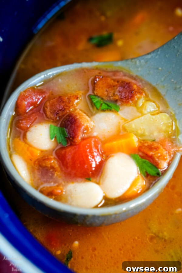 Creamy Butter Bean Delight 6 A ladle of butter bean soup in a blue pan.