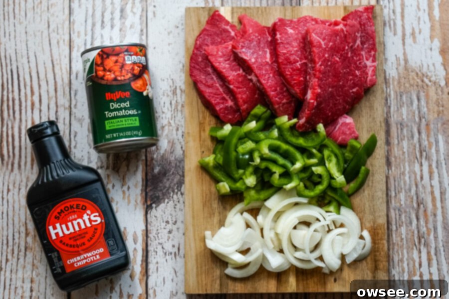 Tender Instant Pot BBQ Swiss Steak 3 The ingredients needed for Instant Pot BBQ Swiss Steak; round steak, bell peppers, onion, canned tomatoes and barbecue sauce.
