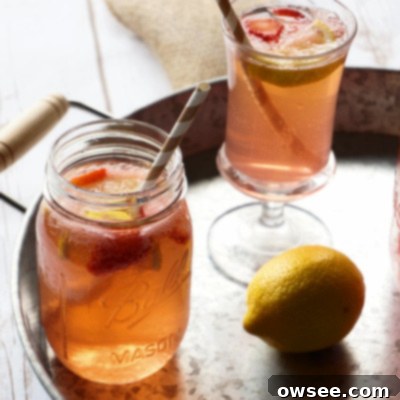 Refreshing Strawberry Lemonade Shandy 2 Homemade Strawberry Lemonade Shandy with fresh fruit and ice