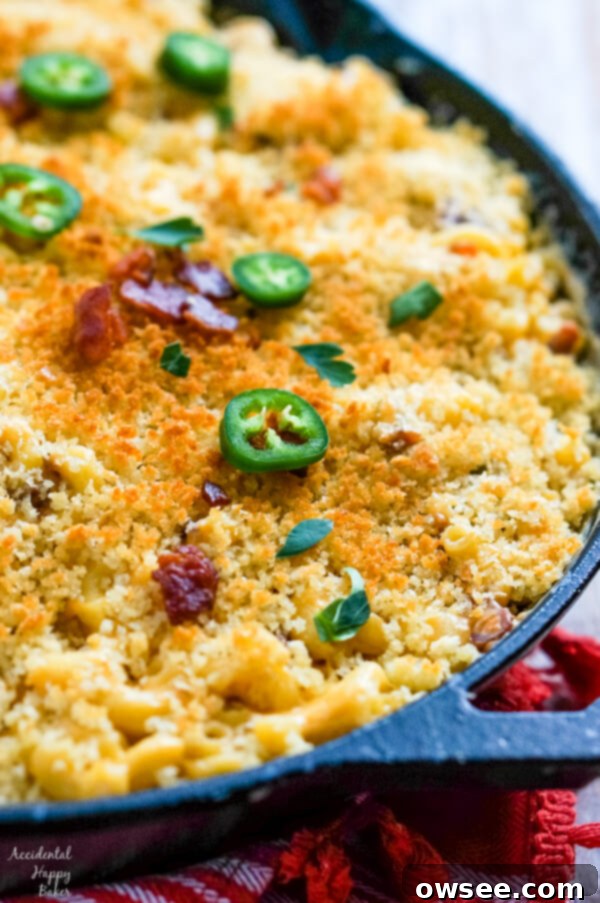 Smoky Jalapeno Bacon Mac and Cheese 9 A close up image that shows the browned bread crumbs, bacon and jalapenos topping the macaroni and cheese.