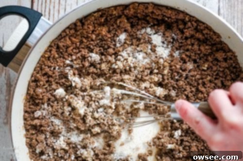 Ground beef with flour mixed in, ready for sauce.