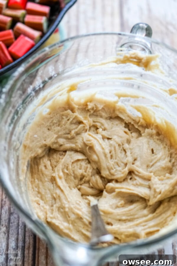 Spiced Rhubarb & Ginger Flip Cake 6 A mixing bowl filled with perfectly combined cake batter, ready for baking.