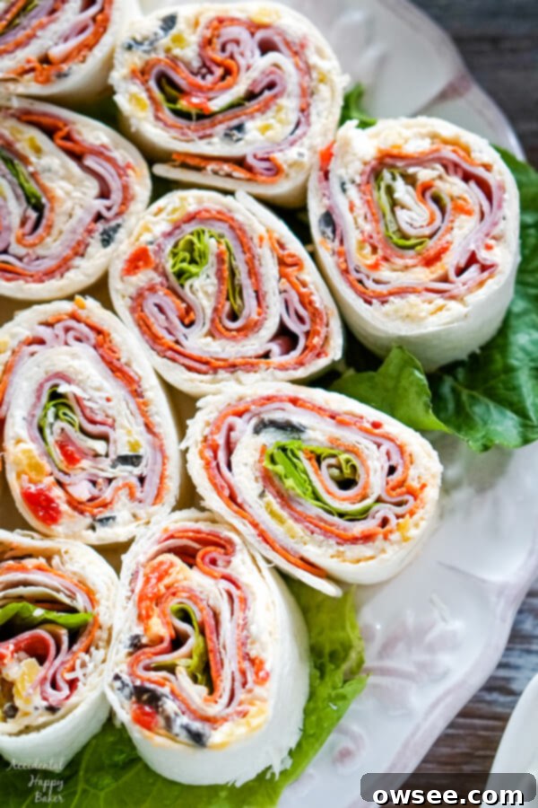 Savory Italian Spirals 7 A large platter of Italian Pinwheels, beautifully arranged for a party, showcasing their colorful layers.