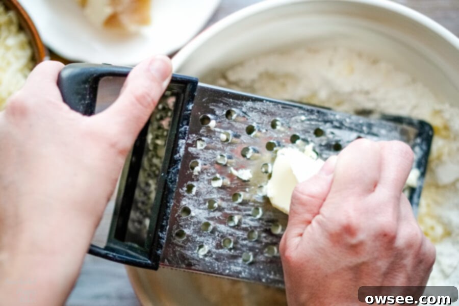 Savory White Cheddar Scones 5 Frozen Butter is grated into the flour mixture.