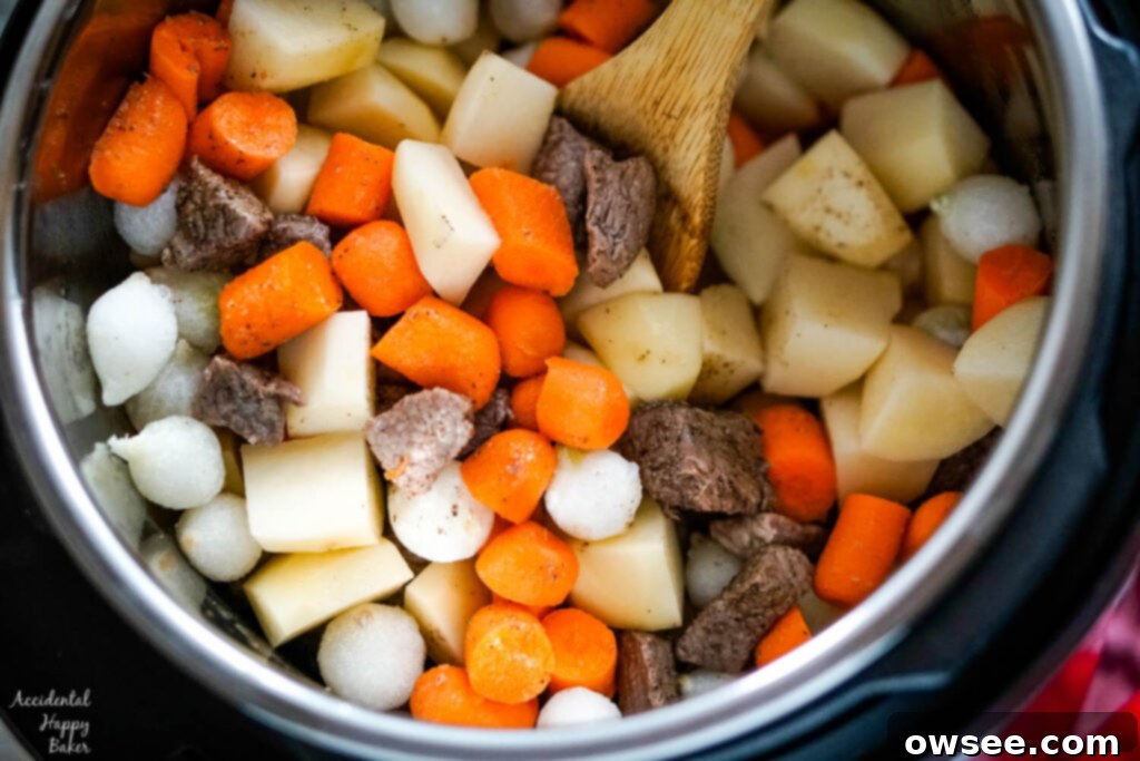 Effortless Instant Pot Beef Stew 4 Potatoes, carrots, and pearl onions are added to the instant pot.