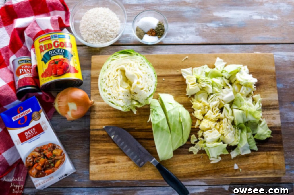 Instant Pot Cabbage Roll Soup with Stove Top Directions 3 The ingredients needed for the cabbage roll soup next to a cutting board with a head of chopped cabbage.