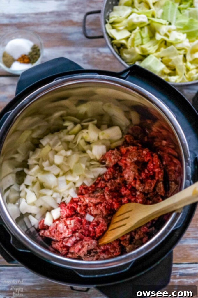 Instant Pot Cabbage Roll Soup with Stove Top Directions 4 Ground beef is browned with onion and garlic in the instant pot.