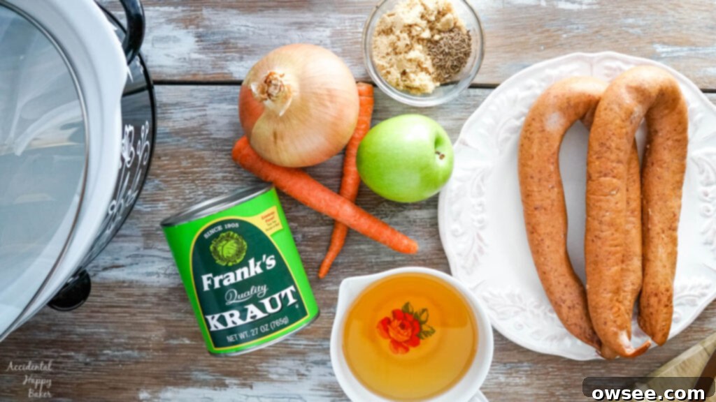Hearty Slow Cooker Kielbasa and Sauerkraut Dinner 4 The ingredients needed for this recipe; sauerkraut, kielbasa, carrots, apple, onion, brown sugar, caraway seeds and apple juice.