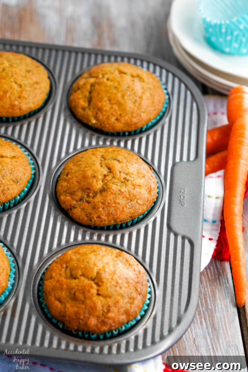 Wholesome Banana Carrot Muffins 9 A stack of three moist Banana Carrot Muffins, combining the flavors of banana bread and carrot cake.