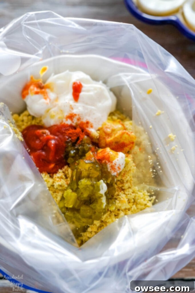 The ingredients for spicy deviled egg filling in a ziploc bag, ready to be combined. 