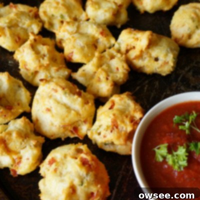 Cheesy Pepperoni Bites 2 Golden brown pepperoni cheese puffs.
