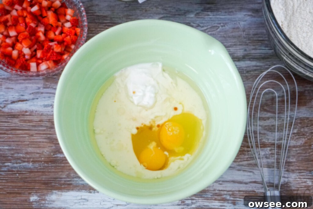Simple Strawberry Yogurt Loaf 6 In a separate bowl combine the greek yogurt, buttermilk, vegetable oil, eggs and vanilla extract.